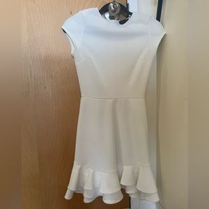 Dress with ruffles at bottom